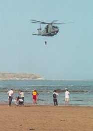 Royal Navy Merlin and winchman