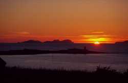 Sunset over the Blaskets over the Lighthouse